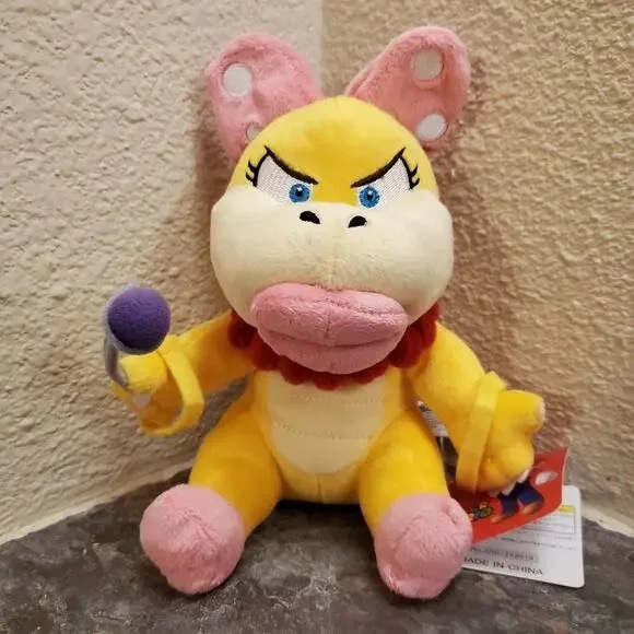 Adorable Yellow and Pink Stuffed Animal with Microphone - Picture 1 of 1